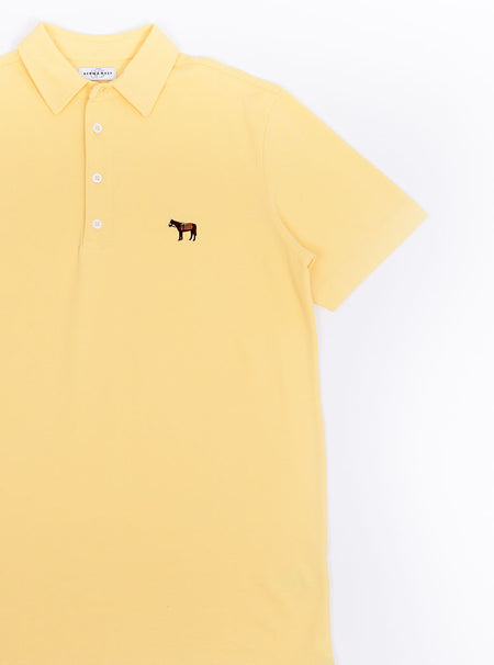 Flat lat of men's lemon yellow polo shirt in 100% cotton with Newmarket 875 horse logo embroidered on the front.